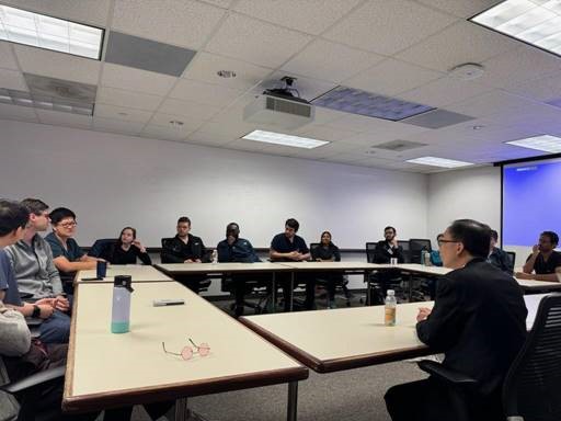 people sitting around tables