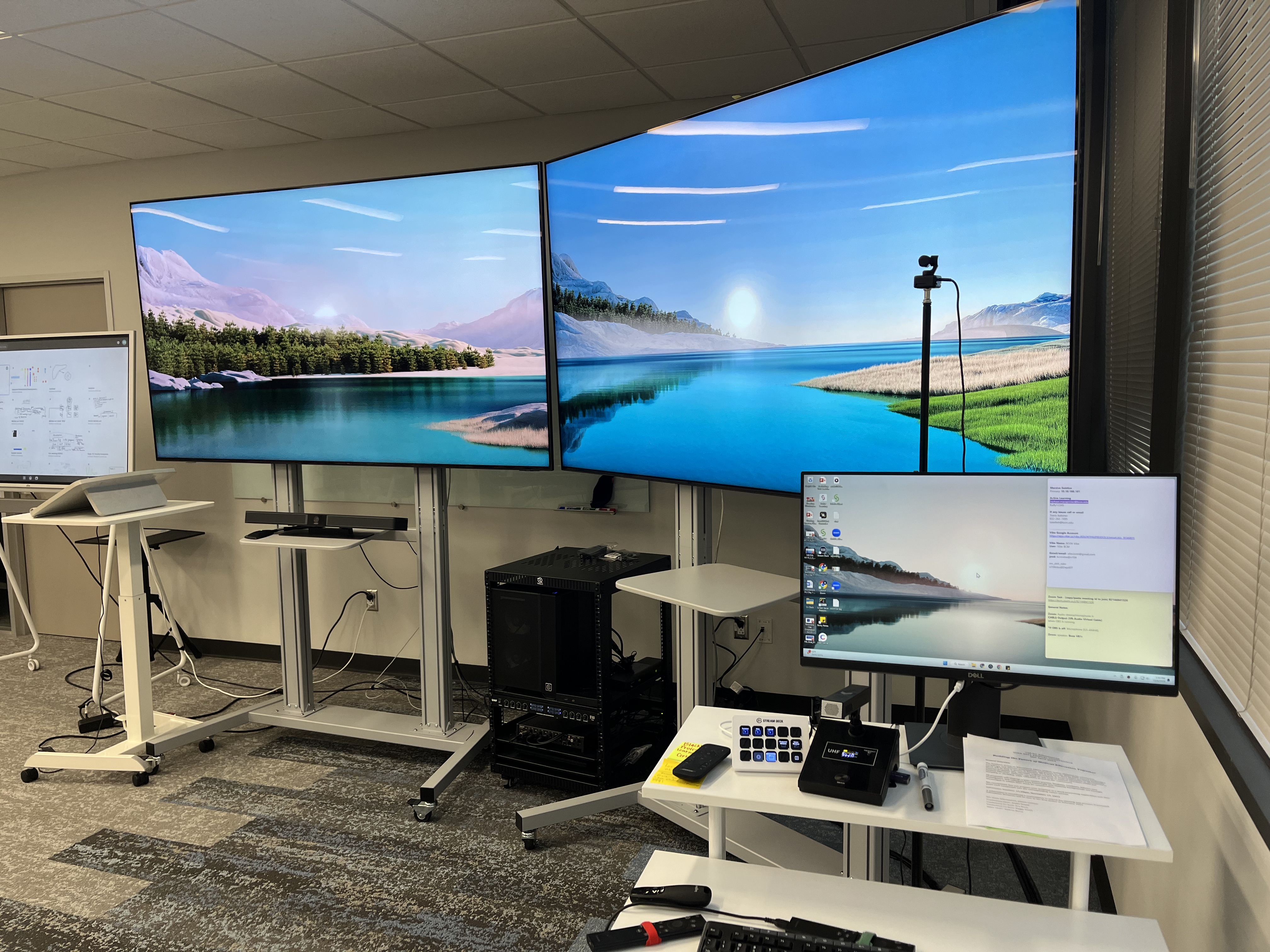 Big display screens and a desktop computer