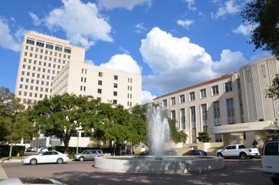 Cullen Building and fountain with the Michael E. DeBakey Center and Alkek Building in the background.
