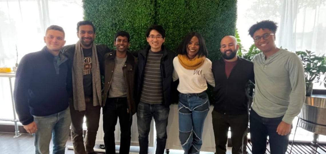 Seven GI fellows smiling for a group picture.