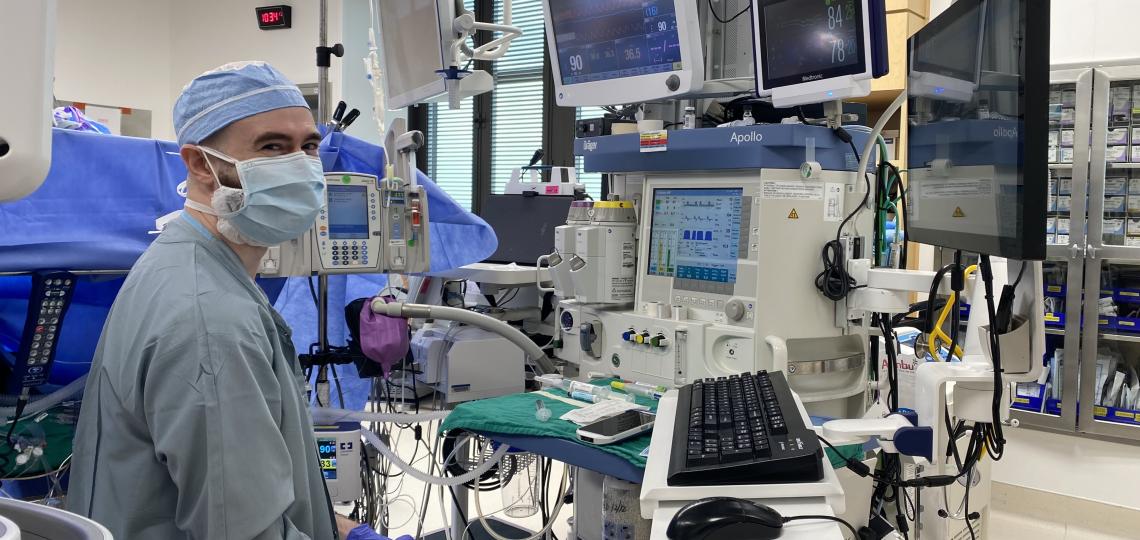 man at surgical computers