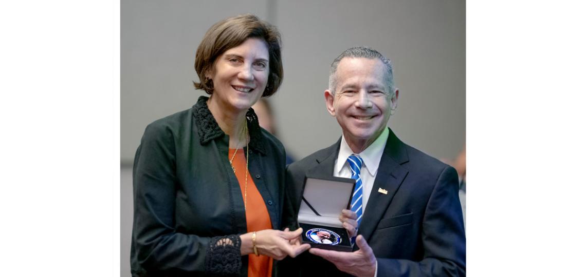 Dr. Allison the Children's Nutrition Research Center receives the Ralph D. Feigin Memorial Grand Rounds Presenter Award from Pediatrician-in-Chief at Texas Children's and Chair of the Department of Pediatrics at Baylor Dr. Lara Shekerdemian.
