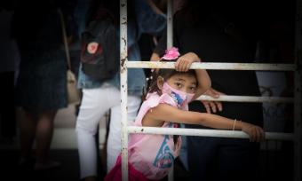 Image of little girl wearing a mask