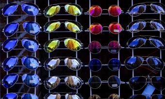 Photo of sunglasses on a display wall