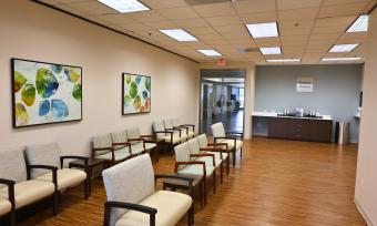 The image shows the new waiting area at the Baylor Medicine Orthopedics and Sports Medicine clinic in Sugar Land. 