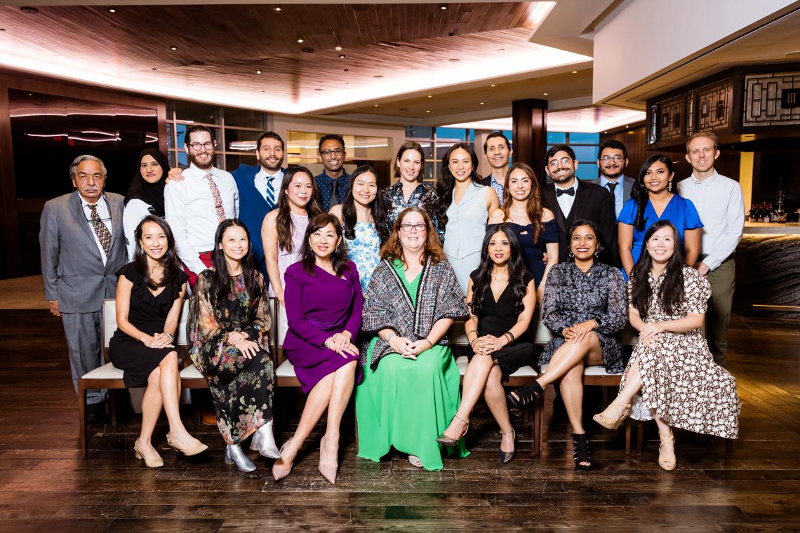 group of people dressed nicely and smiling