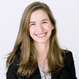 woman with dark blonde hair smiling