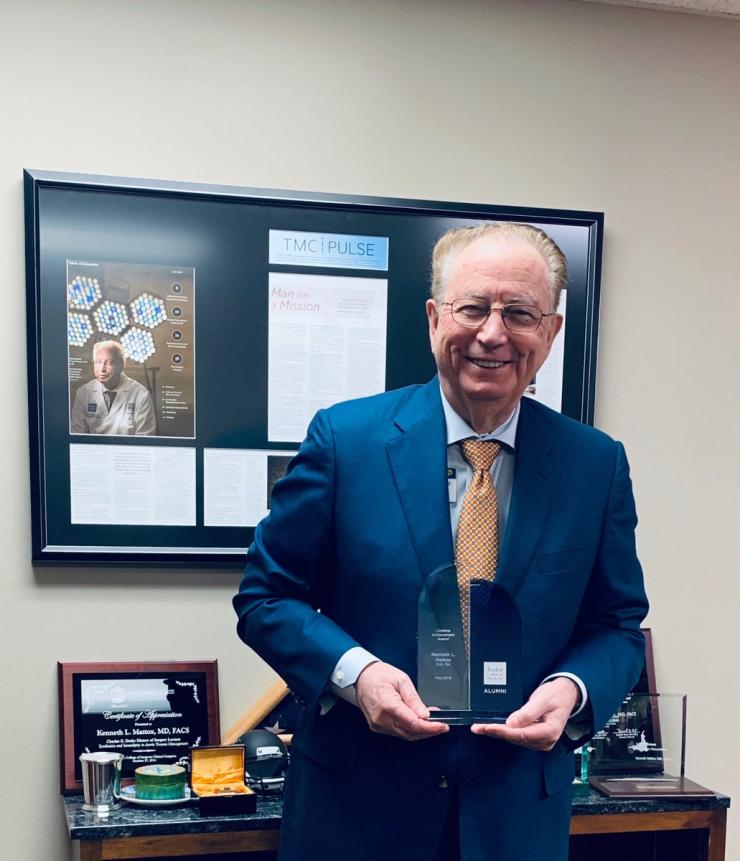 Kenneth L. Mattox, M.D. '64, with his Lifetime Achievement Award.