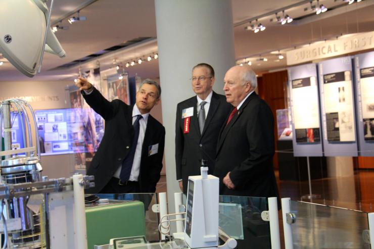 At the Alumni Symposium & 20th Congress of the Michael E. DeBakey International Surgical Society, former Vice President Dick Cheney (right) gets a tour from Dr. Todd K. Rosengart and Dr. Kenneth L. Mattox.