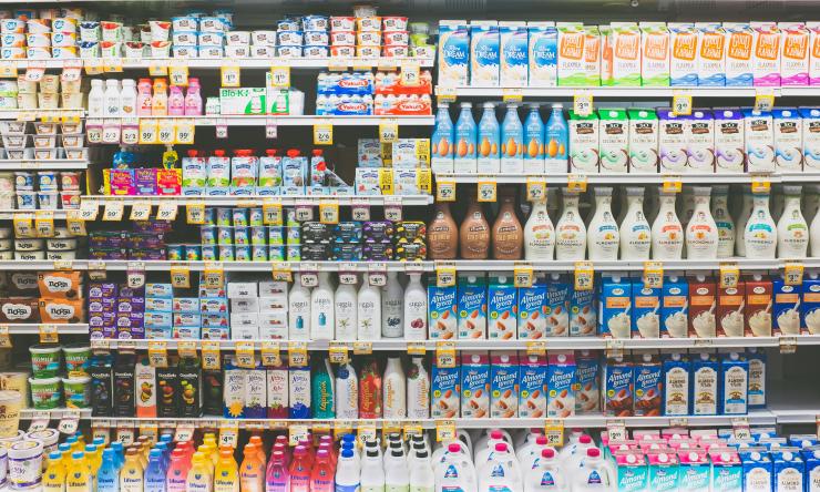 Shelves full of perishable products in a grocery store.