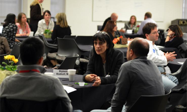 Dr. Bozkurt speaks with faculty members