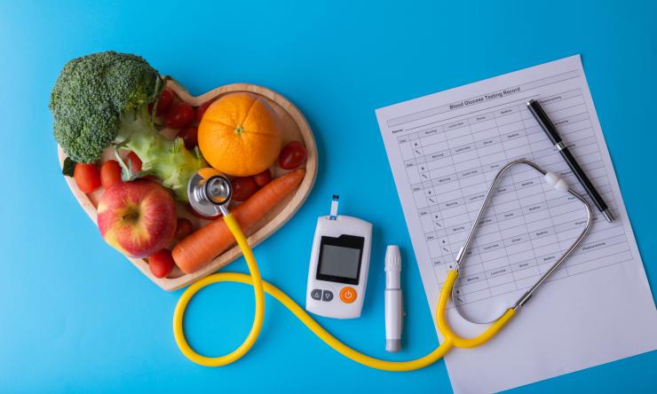 heart shaped plate of vegetables with a piece of paper next to it