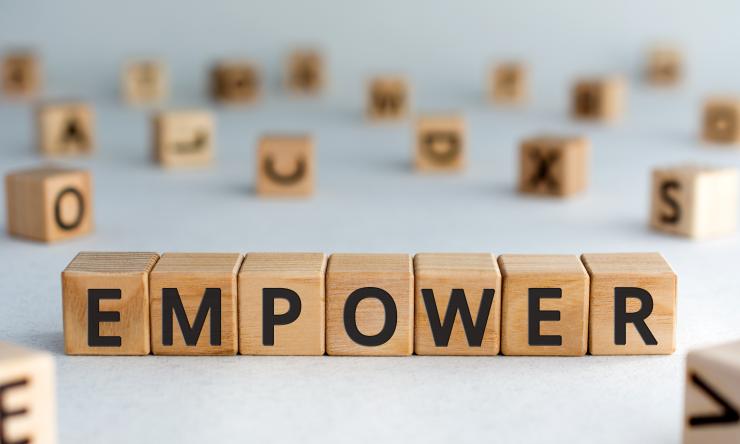 blocks spelling out the word empower