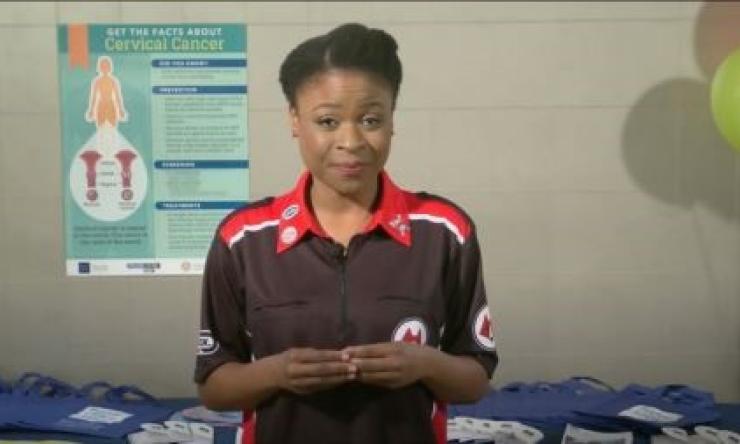 woman stnanding in a medical room with her hands together