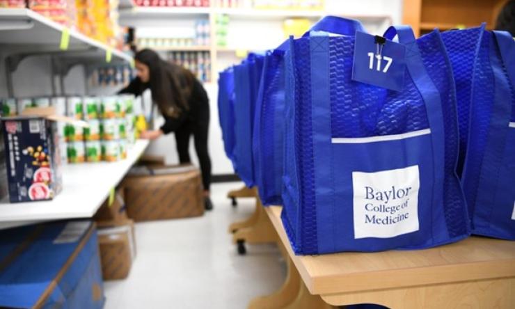 photo of a storeroom with bags labeled Baylor College of Medicine