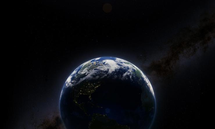 The Earth seen from space, illuminated by sunlight from above.