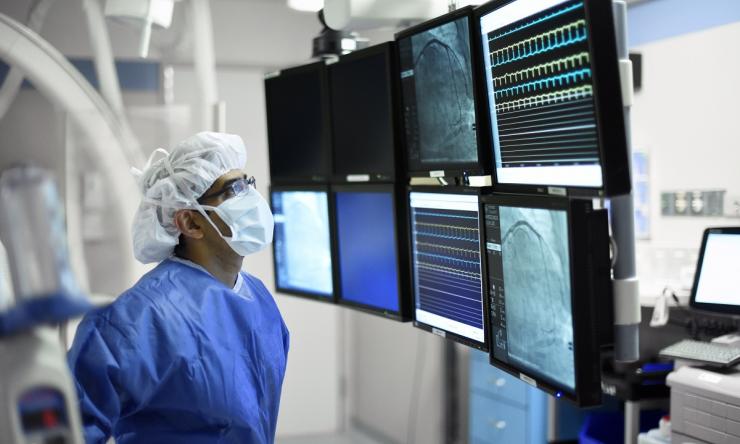 doctor looking at monitors