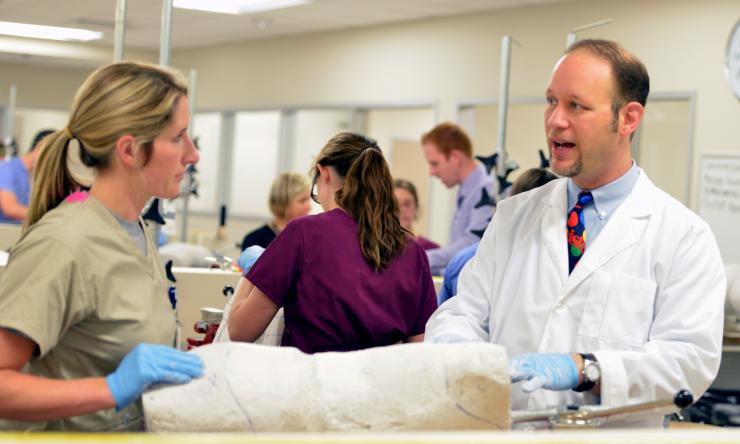 Orthotics and Prosthetics student with faculty member